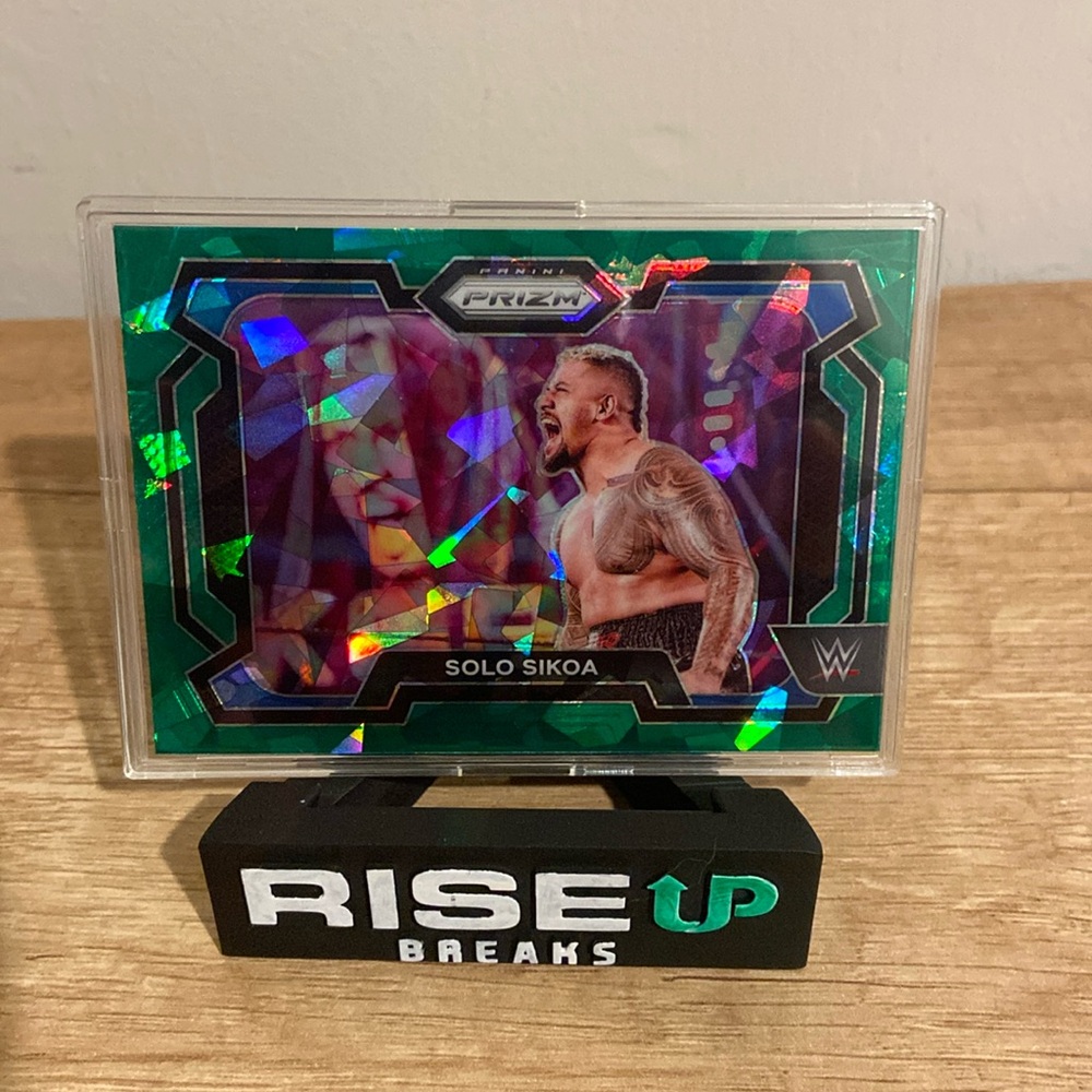 Pre-Owned 2024 Panini Prizm WWE #49 Solo Sikoa Green Ice.